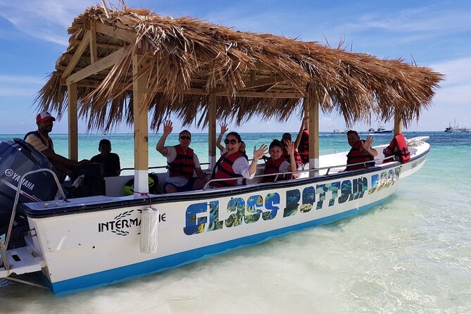 2-Hour Glass Bottom Boat Experience in Punta Cana - Getting on board: Shelting Tours, pickup, and group size