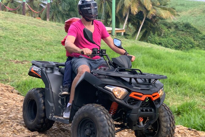 Best ATV Tour In Punta Cana - Playa Esmeralda: long beach riding, coconut trees, and swimming