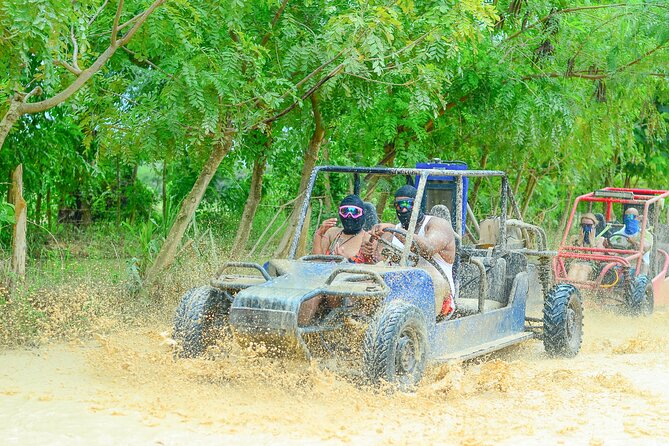 Dune Buggy in Punta Cana - Stop 1: Playa Macao—wide shoreline, palm shade, and surf energy