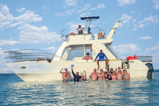 Eco Exploration: Golf Cart Adventure and Catamaran Cruise - Caribbean Catamaran Cruise: Coast Views, Natural Pool Time, and Open Bar