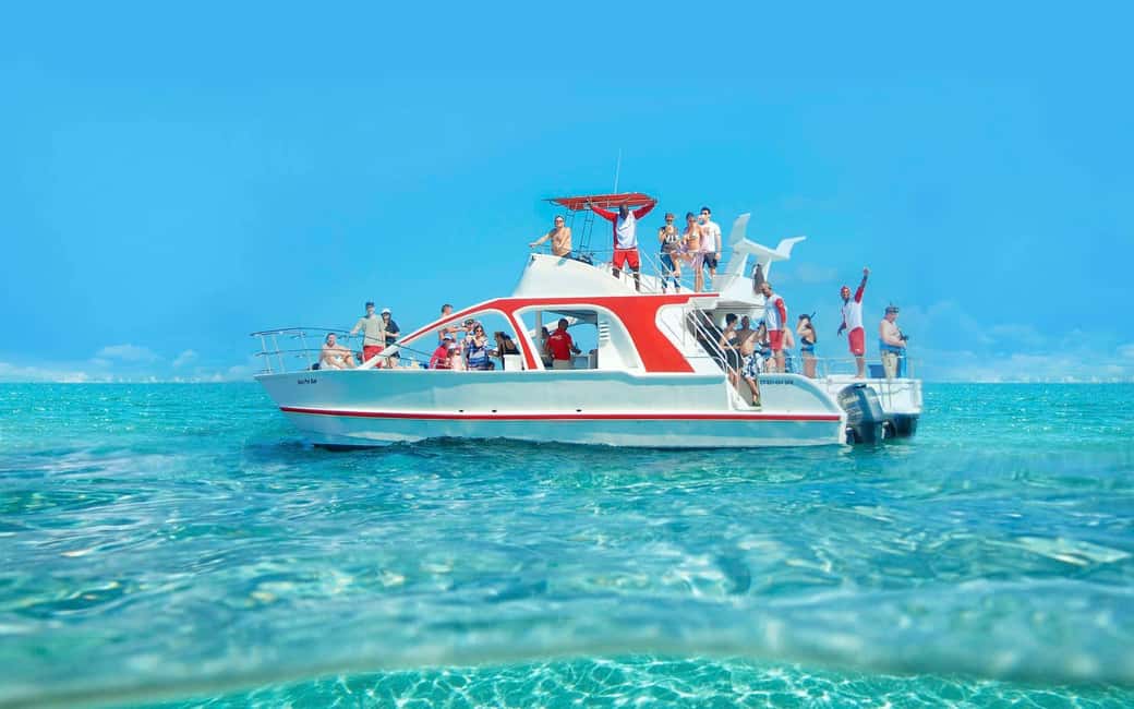From Bavaro, Punta Cana: Boat Party, Snorkeling, Drinks, Snacks, and Transportation - The 30-minute party cruise: open bar, snacks, and music