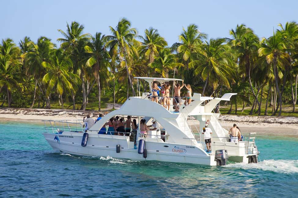 From Bavaro, Punta Cana: Boat Party, Snorkeling, Drinks, Snacks, and Transportation - Dolphin spotting in their habitat: short stop, clear expectations