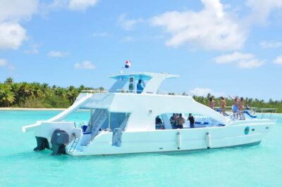 From Los Melones: Saona Island Day Trip with Lunch - The Catamaran Ride: Locals, Music, and the Real-Life Schedule