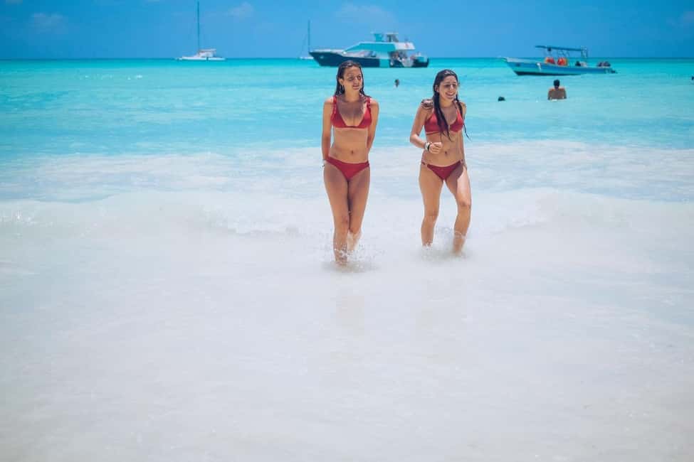 From Punta Cana: Saona Island Day Trip with Buffet Lunch - Snorkeling, Dancing, and Island Entertainment: How the Day Gets Filled