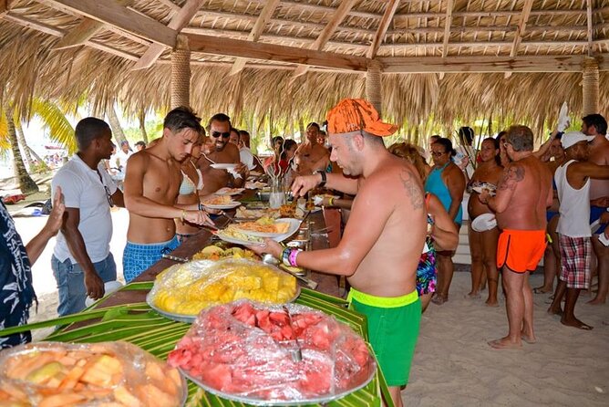 Full-Day Saona Island Tours All Inclusive - Catamaran cruise: what you gain with music, restrooms, and shade