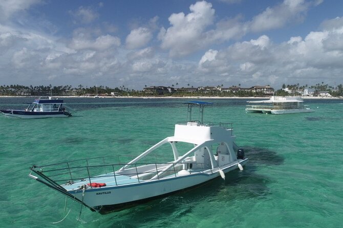 GlassBottom Catamaran with Slide - Onboard Game Plan: Glass-Bottom Time, Snorkeling, and the Ocean Slide