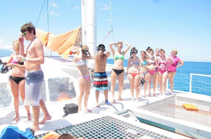Half Day Catamaran & Snorkeling - On the catamaran: Punta Cana coast views and that cruising rhythm