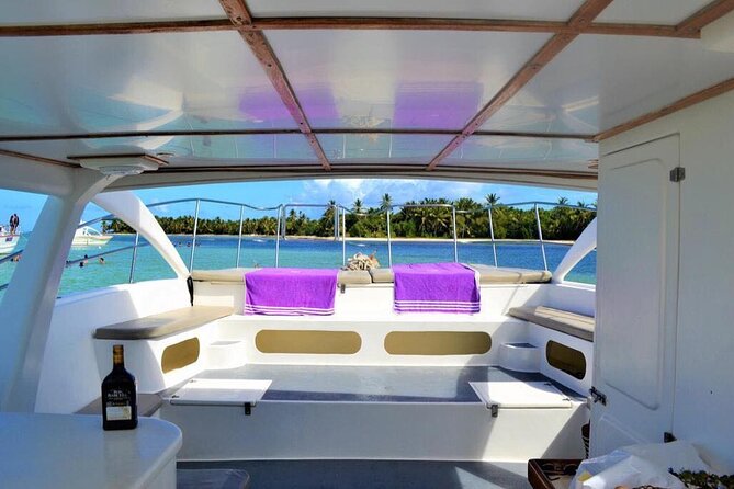 Private VIP Catamaran Party Boat Punta Cana Bavaro - Your 3-hour route: coral reef snorkeling, coconuts on the beach, natural pool time