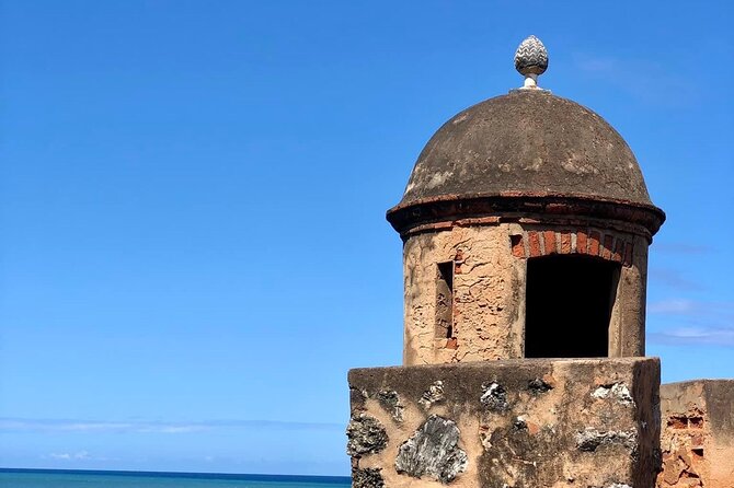 Puerto Plata City Tour with beach Taino bay & amber cove - The early stops: rum at Macorix, Umbrella Street, and the pink photo street