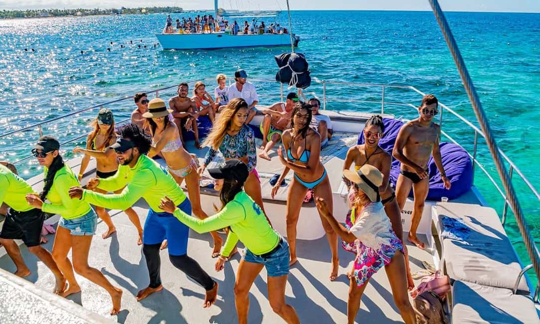 Punta Cana Area: Party Cruise with Parasailing and Open Bar - Onboard Atmosphere: The Open Bar Is Part of the Experience