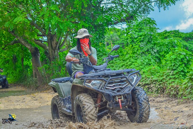 Punta Cana ATV Adventure Through Jungle Trails - Macao Beach Finish After the Mud: Waves, Sand, and Limestone Cliffs