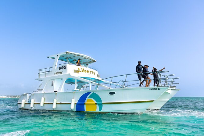 Punta Cana Boat Cruise and Snorkeling with Open Bar - Boarding the shared boat: comfort, vibe, and group size