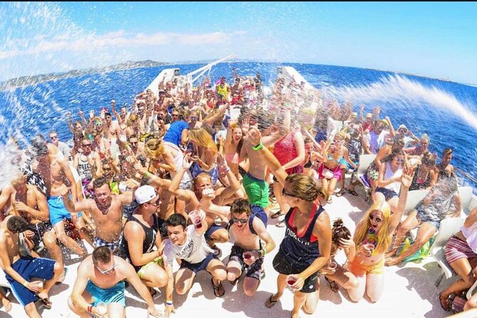 Punta Cana Booze Cruise, Snorkeling, Bar Entertainment Open Bar - Floating water pad, water slide, and beach games