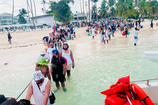 Punta Cana Hip Hop Party Boat with Snorkeling & Unlimited Drinks - Snorkeling stop with life jacket, mask, fish, and a natural water slide