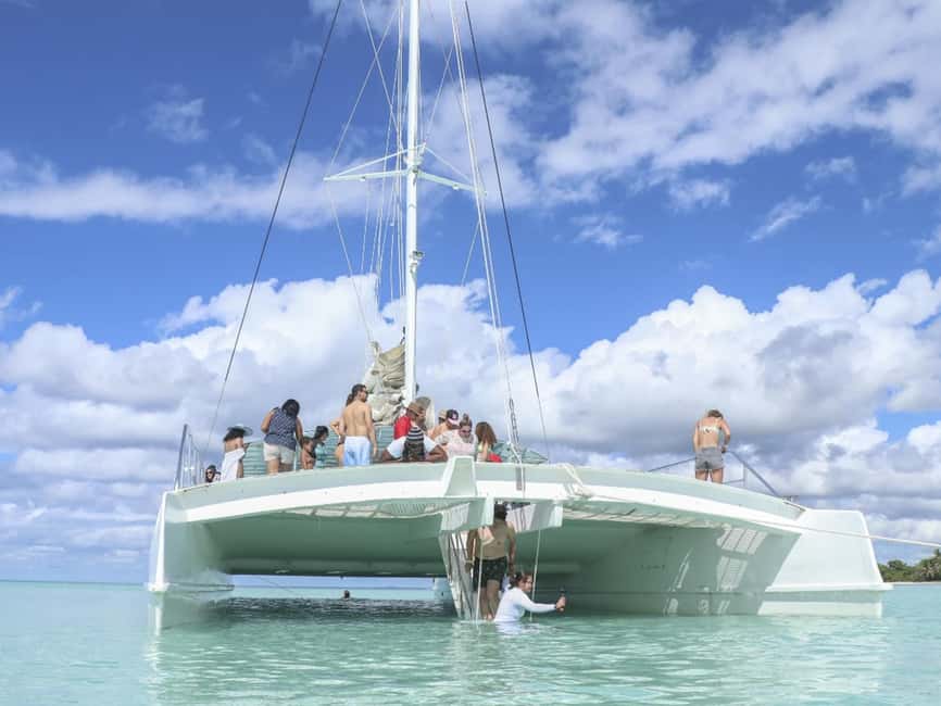 Punta Cana: Saona Island Day Trip with Blue Lagoon & Lunch - Hotel pickup, a shopping stop, and the road to La Romana