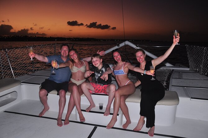 Punta Cana Sunset Catamaran Cruise with BBQ, Champagne & Music - Onboard experience: open bar, champagne toast, WiFi, and music
