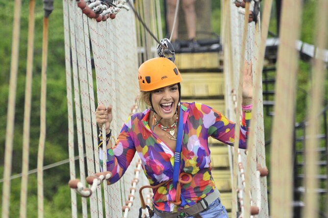 Punta Cana Ziplines, Hanging Bridge, and Waterfall Pool Adventure - Blue Lagoon Cenote and the Water Landing Moment
