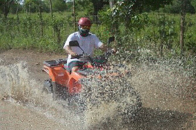 River Cave and Macao Beach Half-Day Quad Bike Adventure - Macao Beach stop: crystal water and a short window