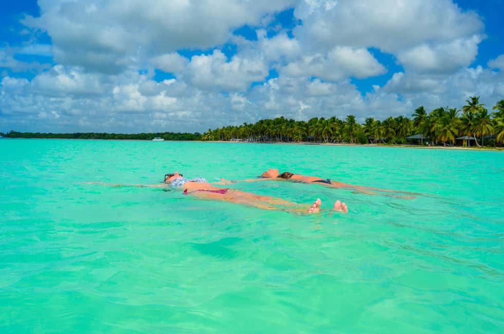 Saona Exclusive Catamaran – Small Group Experience - Natural Pool: turquoise sandbank, clear water, and starfish rules