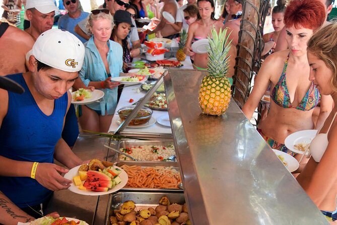 Saona Island Adventure From Punta Cana With Lunch and Transportation - The Return Catamaran Ride: Music, Unlimited Drinks, Snacks, and Dancing