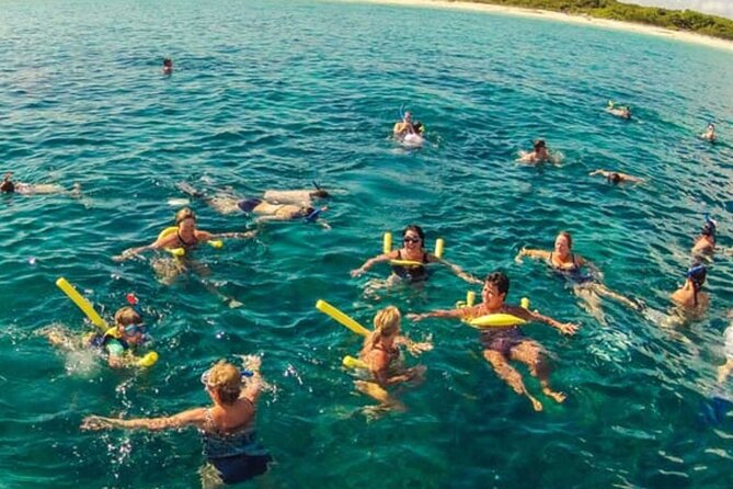 Saona Island Catamaran Adventure with Free Food and Transportation - Return by catamaran: snacks, unlimited drinks, dancing