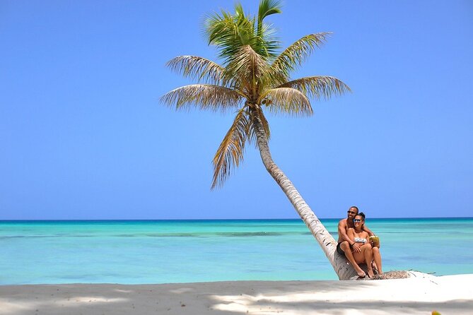 Saône Island from Punta Cana Catamaran, Natural Pool and Lunch - Catamaran Going Out: Music, Drinks, and Group Energy